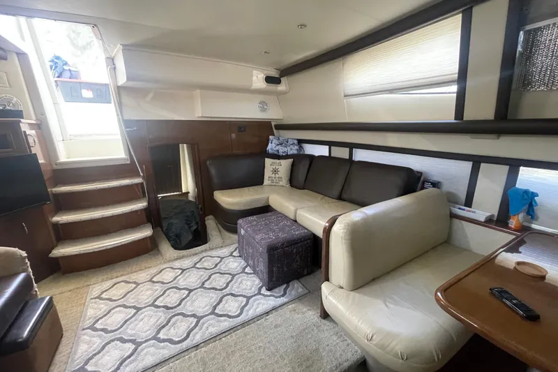 Slide: The Image of Luxurious interior of 2008 Carver 41 Cockpit Motor Yacht with plush seating and elegant decor. - 20
