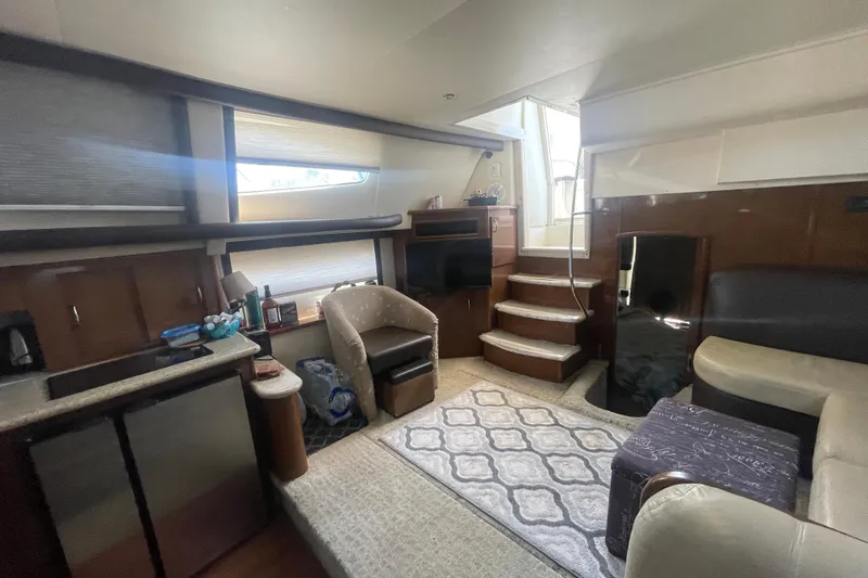 Slide: The Image of Interior of 2008 Carver 41 Cockpit Motor Yacht with cozy seating and modern amenities. - 21