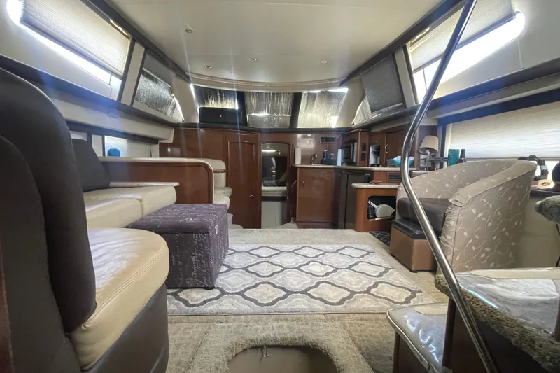 Slide: The Image of Luxurious interior of a 2008 Carver 41 Cockpit Motor Yacht with elegant furnishings. - 38