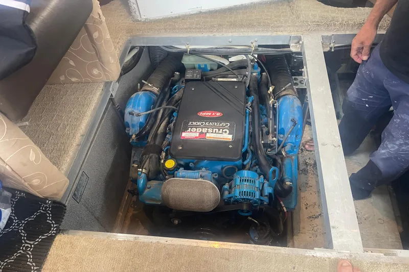 Slide: The Image of Engine compartment of a 2008 Carver 41 Cockpit Motor Yacht, featuring a Crusader engine. - 40