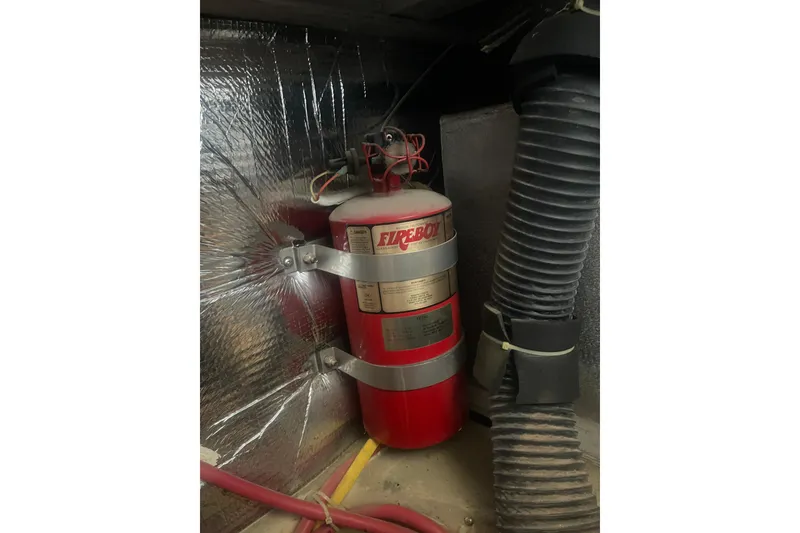 Slide: The Image of Fire extinguisher in 2008 Carver 41 Cockpit Motor Yacht engine room. - 43