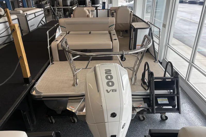 Slide: The Image of Crest 230SLC Conquest 2026 with Mercury 200 V6 engine in showroom. - 6