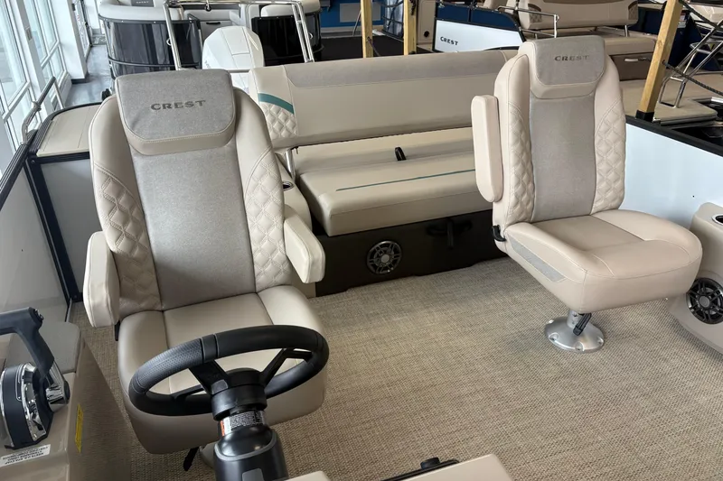 Slide: The Image of Interior of Crest 230SLC Conquest 2026 with luxurious seating. - 7