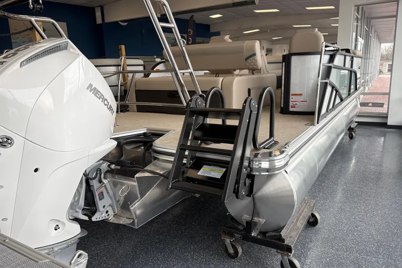Slide: The Image of Crest 230SLC Conquest 2026 pontoon boat in showroom. - 8