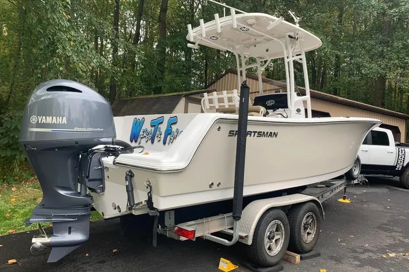 Slide: The Image of 2018 Sportsman Open 232 Center Console boat on trailer with Yamaha outboard motor. - 16
