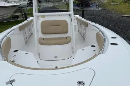Slide: The Image of 2018 Sportsman Open 232 Center Console boat with spacious seating and sleek design. - 6