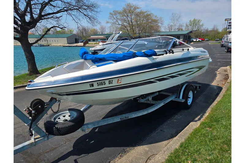 Slide: The Image of 2007 Glastron GT 185 boat on trailer by lakeside, ready for adventure. - 8