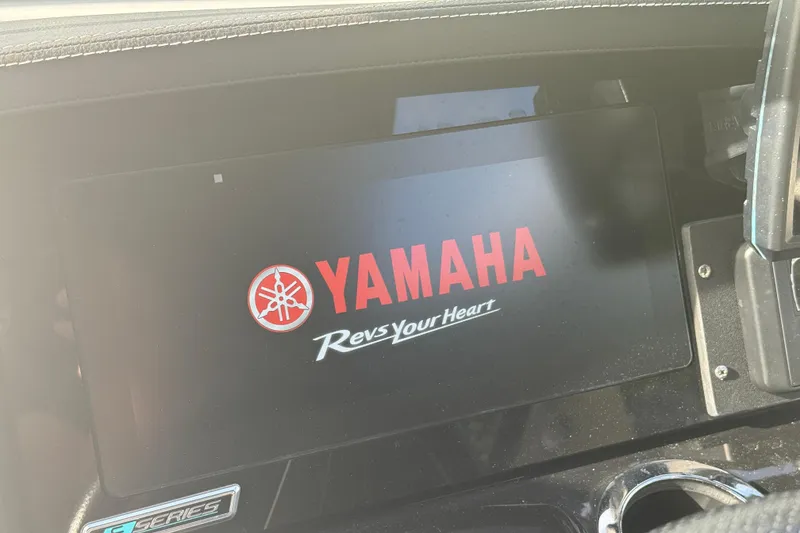 Slide: The Image of Dashboard display of 2018 Yamaha Boats 242 Limited S E-Series with logo and slogan. - 24