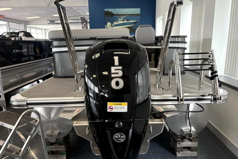 Slide: The Image of 2026 Crest 210L Conquest pontoon boat with a 150 horsepower Mercury outboard motor. - 3