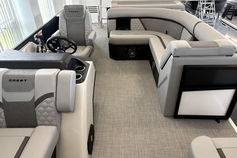 Slide: The Image of Interior of Crest 210L Conquest 2026 with luxurious seating. - 6
