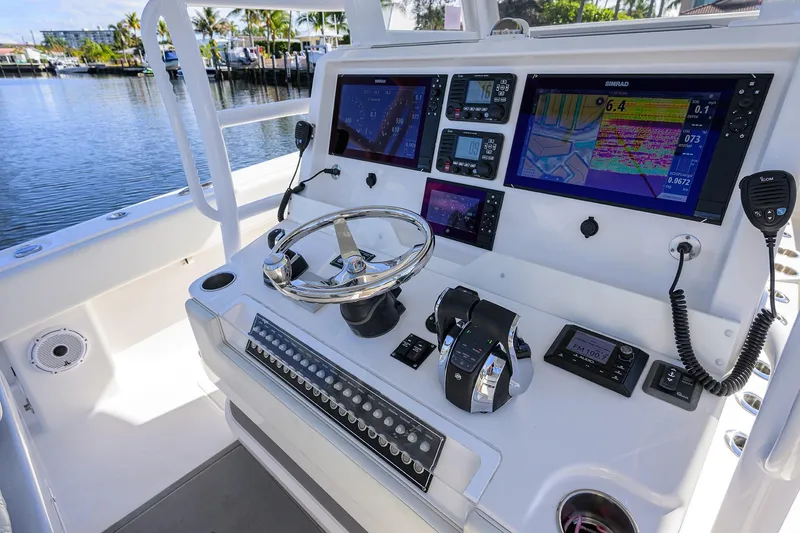 Slide: The Image of Control panel of 2021 Invincible 39 Open Fisherman boat with advanced navigation systems. - 21
