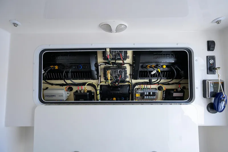 Slide: The Image of Electrical panel of 2021 Invincible 39 Open Fisherman boat, featuring advanced wiring and components. - 68