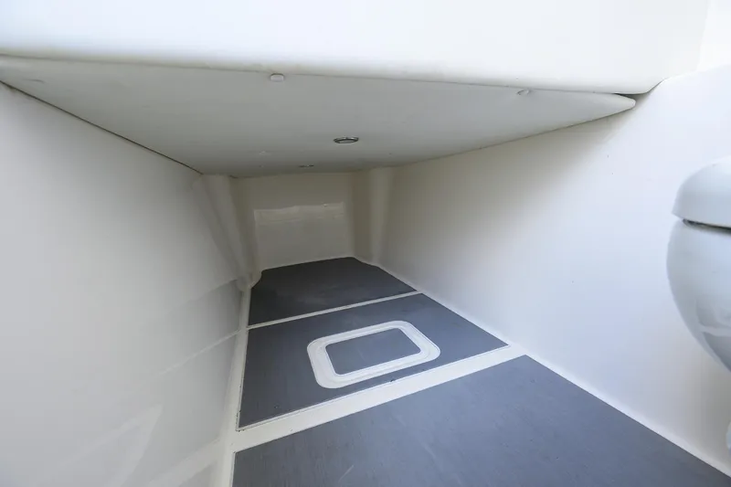 Slide: The Image of 2021 Invincible 39 Open Fisherman interior storage compartment, spacious and well-lit. - 70