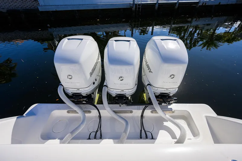 Slide: The Image of Triple Mercury outboard engines on 2021 Invincible 39 Open Fisherman boat. - 73