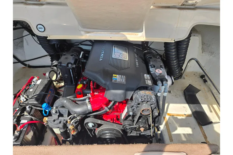 Slide: The Image of Engine compartment of a 2005 Glastron GX 235 boat with Volvo Penta engine. - 24