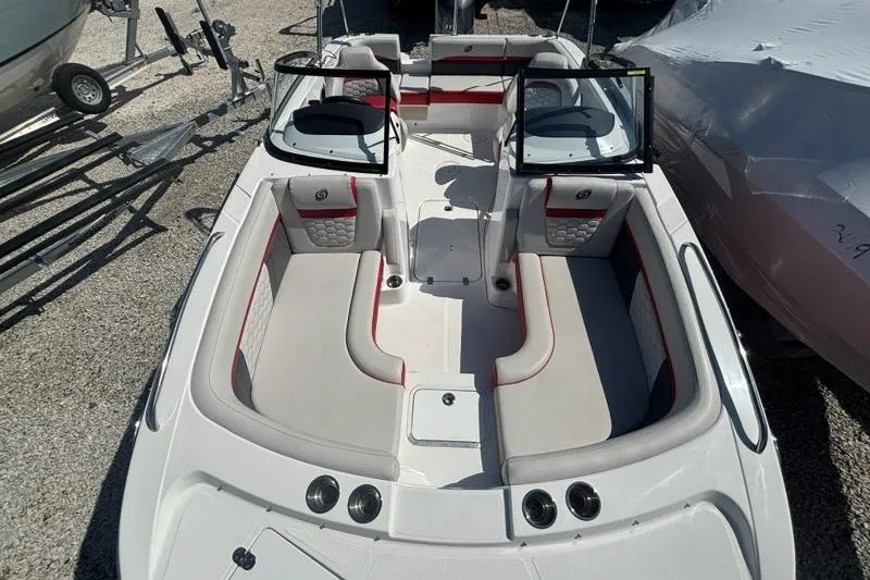 Slide: The Image of 2020 Hurricane SunDeck 191 OB boat interior with seating and open windshield. - 5
