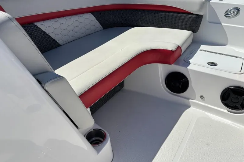 Slide: The Image of 2020 Hurricane SunDeck 191 OB boat interior with red and white seating. - 7