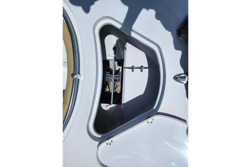 Slide: The Image of 2024 Sportsman Open 232 Center Console anchor storage compartment. - 12
