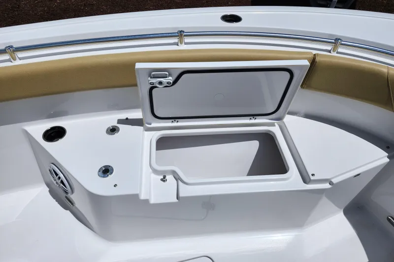 Slide: The Image of 2024 Sportsman Open 232 Center Console boat with open storage compartment. - 17