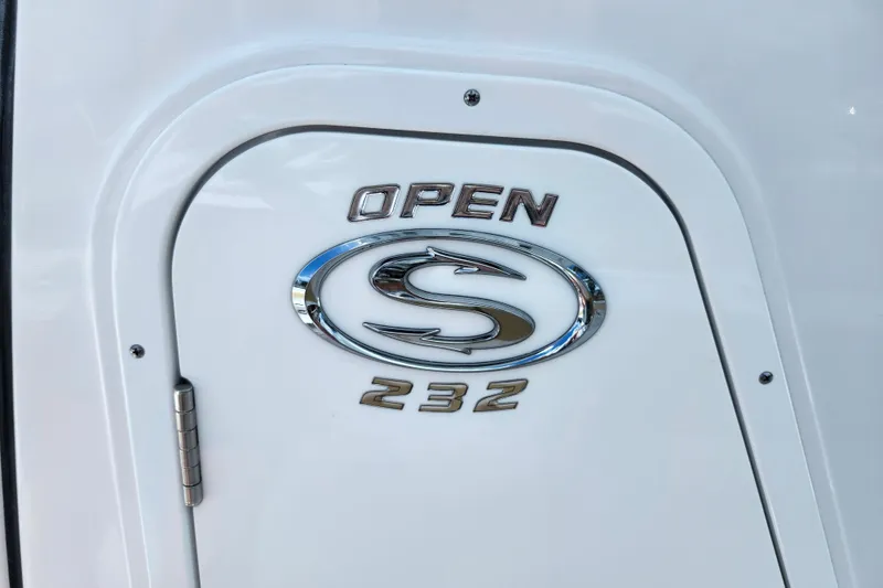 Slide: The Image of 2024 Sportsman Open 232 Center Console logo on white surface. - 24