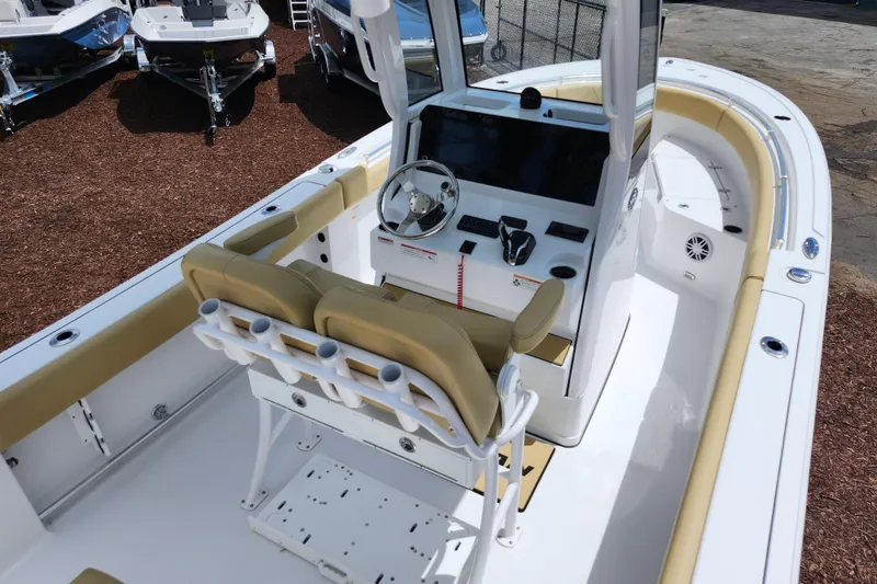Slide: The Image of 2024 Sportsman Open 232 Center Console boat with modern helm and seating. - 47