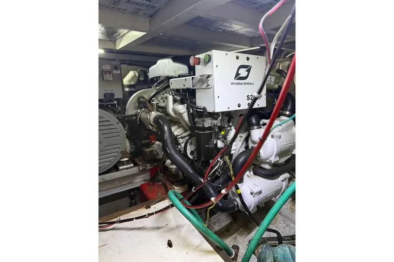 Slide: The Image of Engine room of a 1988 President 35 Double Cabin boat with Hyundai Seasall engine. - 15