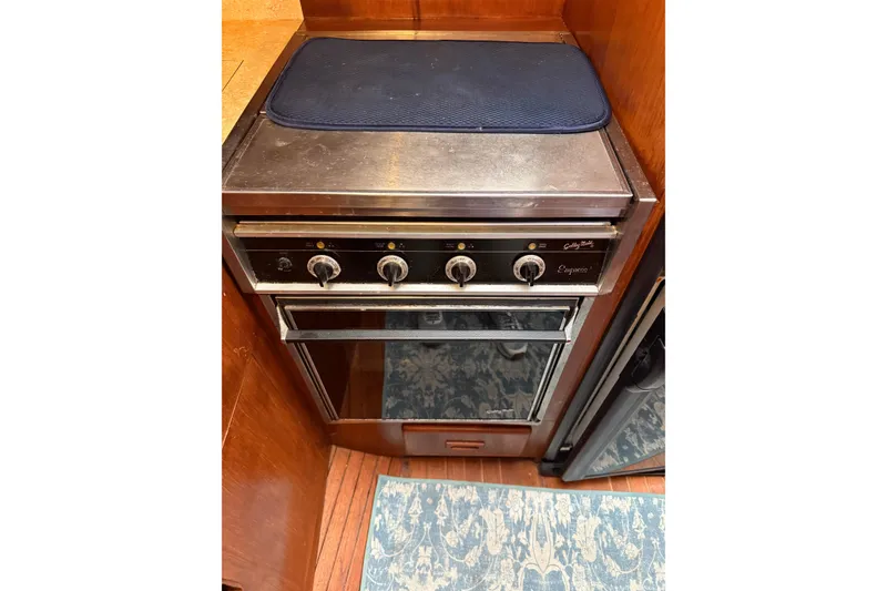 Slide: The Image of Vintage stove in 1988 President 35 Double Cabin yacht kitchen. - 24
