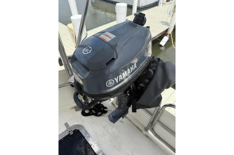 Slide: The Image of Yamaha outboard motor on 1988 President 35 Double Cabin boat at dock. - 44