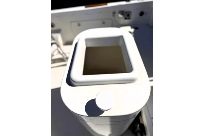 Slide: The Image of Livewell on a 1991 Bertram 28 boat, featuring a white rectangular opening. - 22