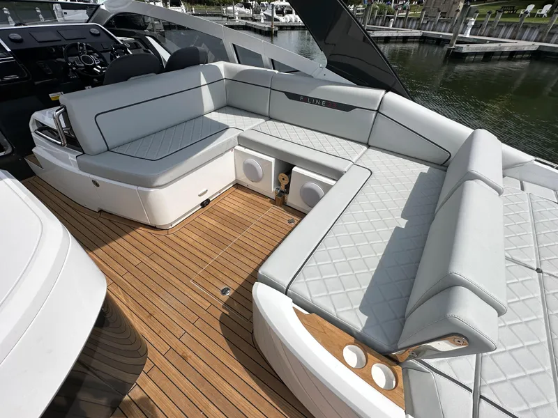 Slide: The Image of 2023 Fairline F//Line 33 Outboard boat with luxurious seating and teak deck. - 7