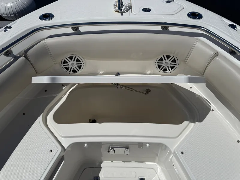Slide: The Image of Interior view of 2024 Boston Whaler 230 Outrage boat storage. - 11
