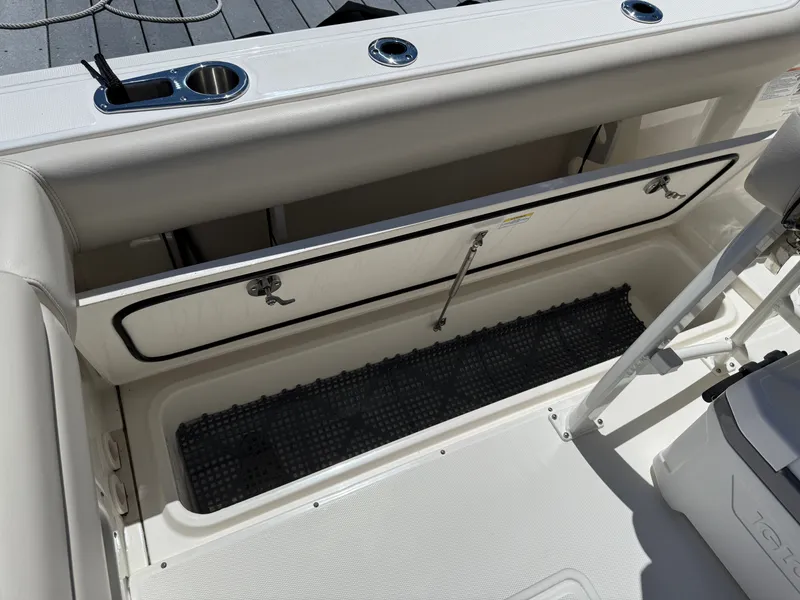 Slide: The Image of Storage compartment in 2024 Boston Whaler 230 Outrage boat. - 33