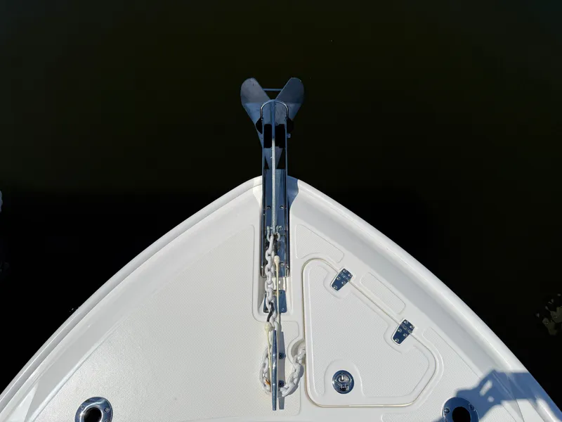 Slide: The Image of Bow of 2024 Boston Whaler 230 Outrage with anchor. - 9
