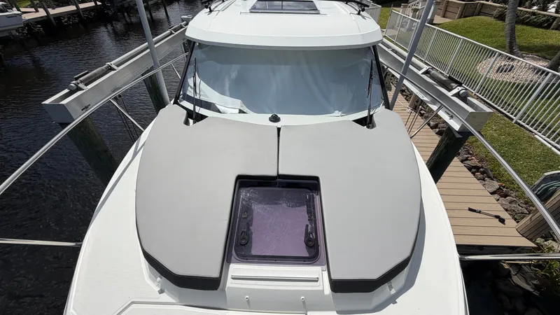 Slide: The Image of 2024 Jeanneau NC 795 Series 2 boat top view at dock. - 16