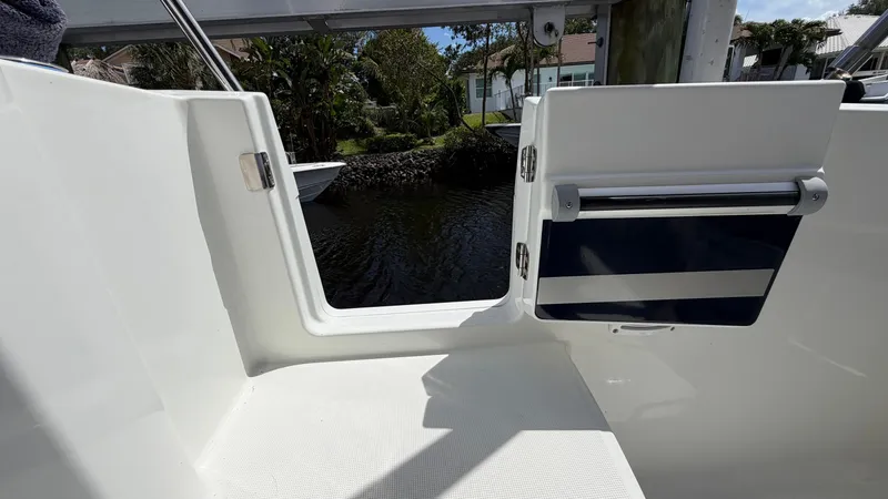 Slide: The Image of Jeanneau NC 795 Series 2, 2024, boat door with water view. - 19