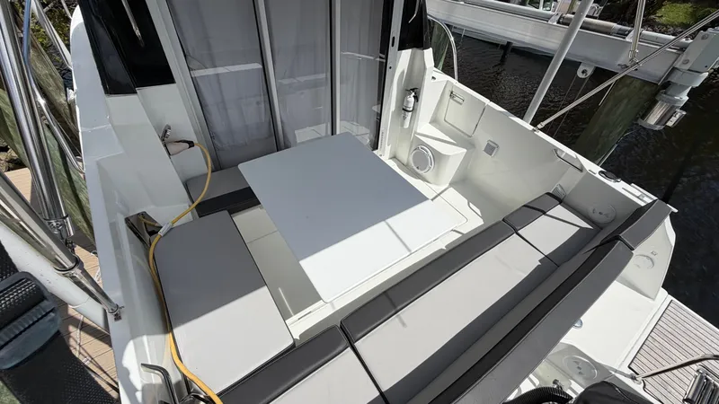 Slide: The Image of Jeanneau NC 795 Series 2, 2024, boat cabin with seating and table. - 20