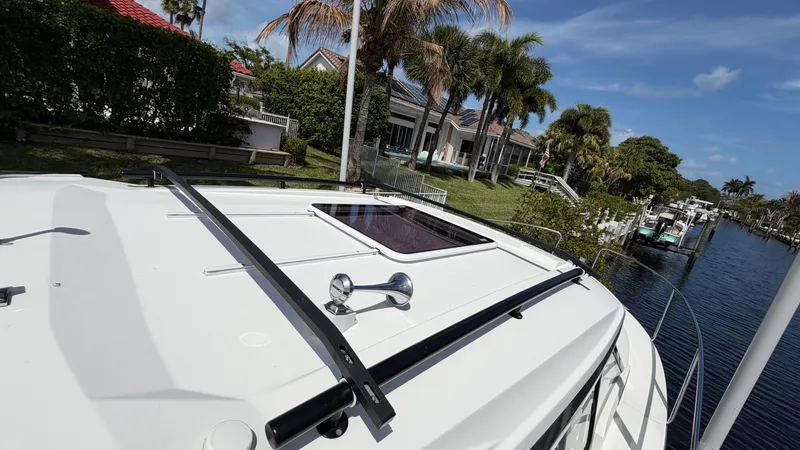 Slide: The Image of Jeanneau NC 795 Series 2 boat roof with waterfront view, 2024 model. - 9