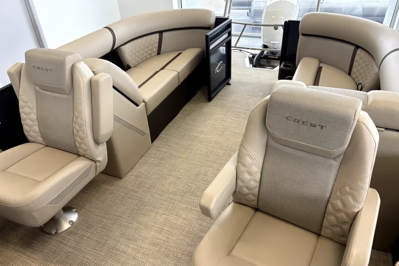Slide: The Image of Interior of Crest 235 SLC Conquest 2026 with luxurious seating. - 6