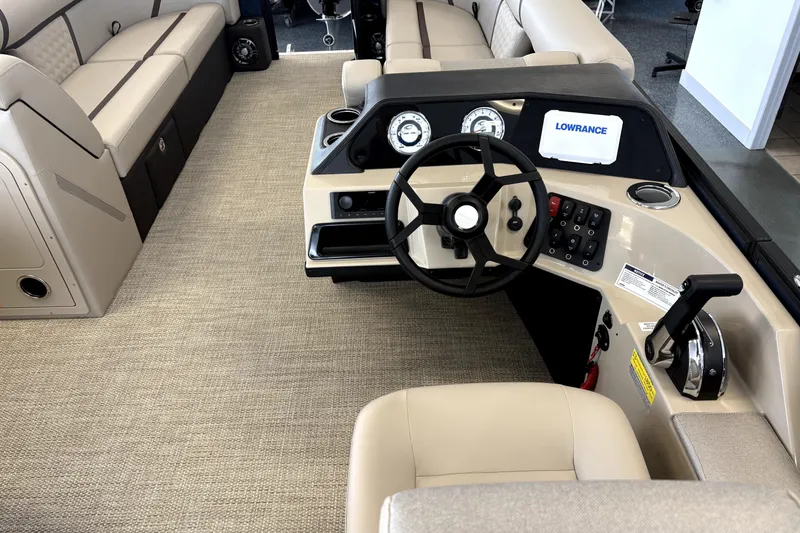Slide: The Image of Interior of Crest 235 SLC Conquest 2026 with steering console. - 7