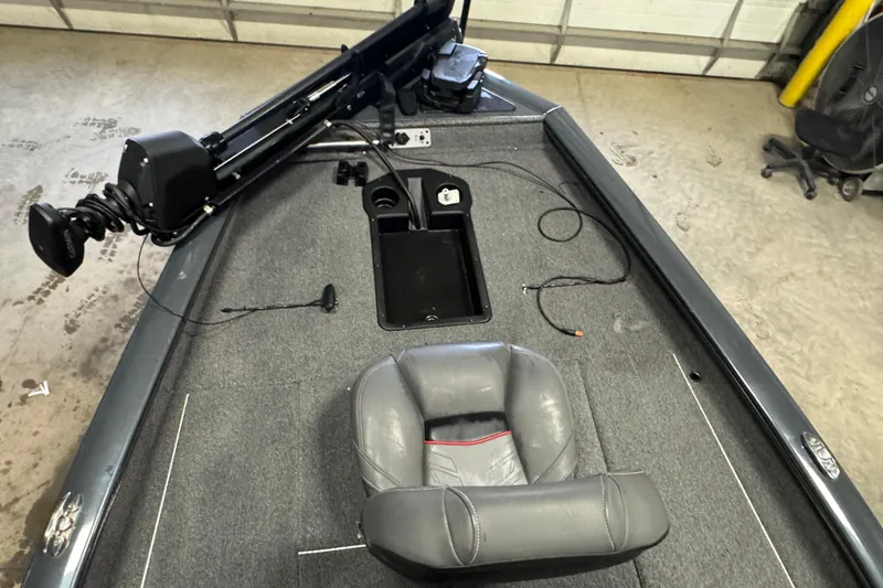 Slide: The Image of 2022 Tracker Pro Team 190 TX boat interior with seat and equipment. - 7