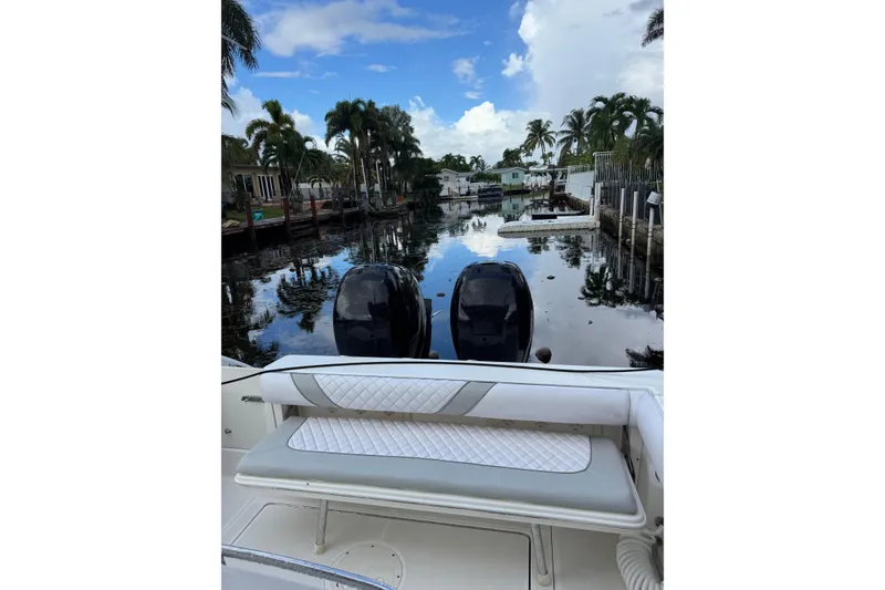 Slide: The Image of Interior of 2006 Boston Whaler 320 Outrage Cuddy Cabin bathroom with toilet and sink. - 14