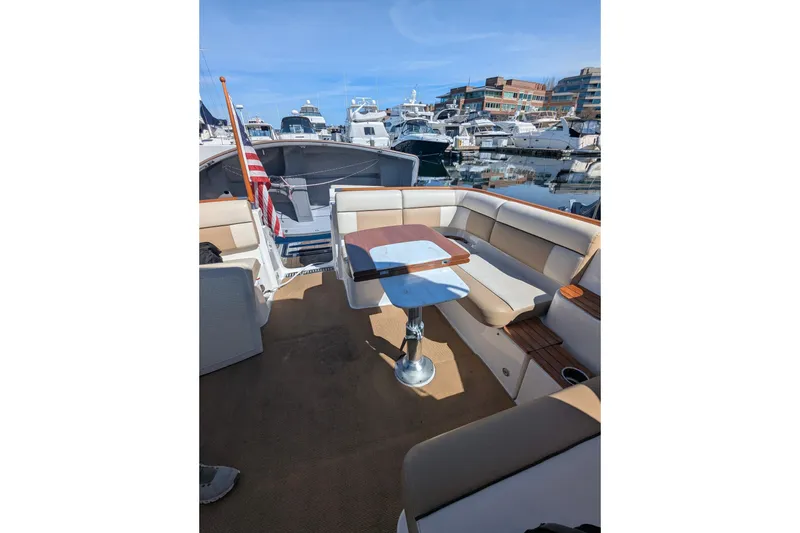 Slide: The Image of Tiara Yachts logo on 2014 Tiara 3100 Coronet boat exterior. - 15