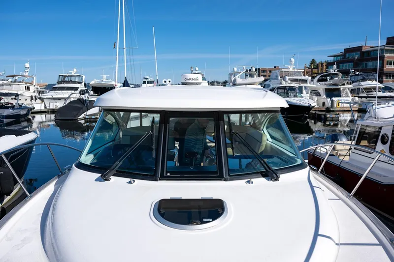 Slide: The Image of Close-up of 2014 Tiara Yachts 3100 Coronet deck with anchor chain and fittings. - 21
