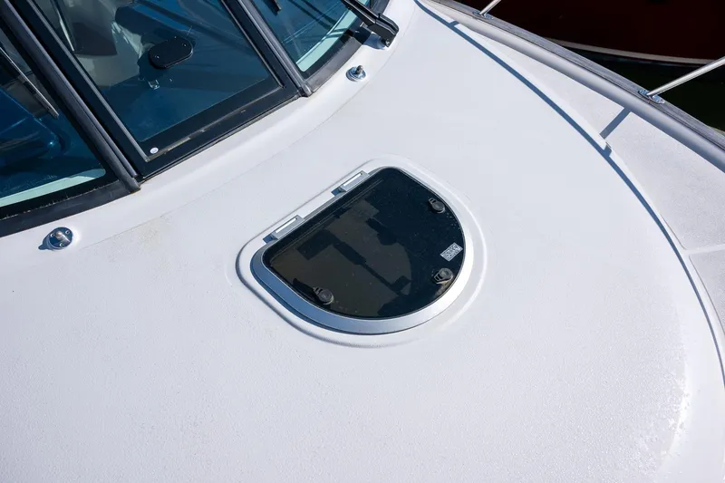 Slide: The Image of 2014 Tiara Yachts 3100 Coronet swim platform with American flag. - 23