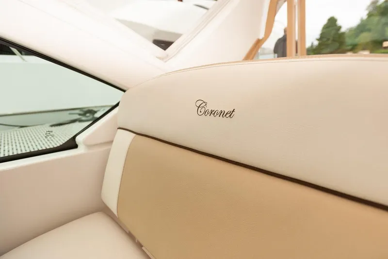 Slide: The Image of Interior of 2014 Tiara Yachts 3100 Coronet, featuring helm and seating area. - 33