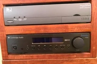 Slide: The Image of Cambridge Audio stereo system and DirecTV receiver in a 1996 Nordic Tug 32. - 10