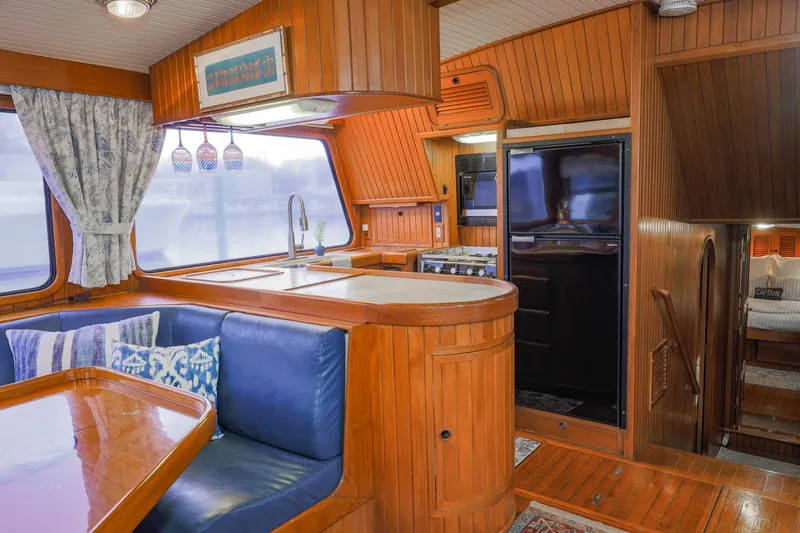Slide: The Image of Luxurious 1990 Hans Christian Independance yacht interior with wood finish and modern amenities. - 7
