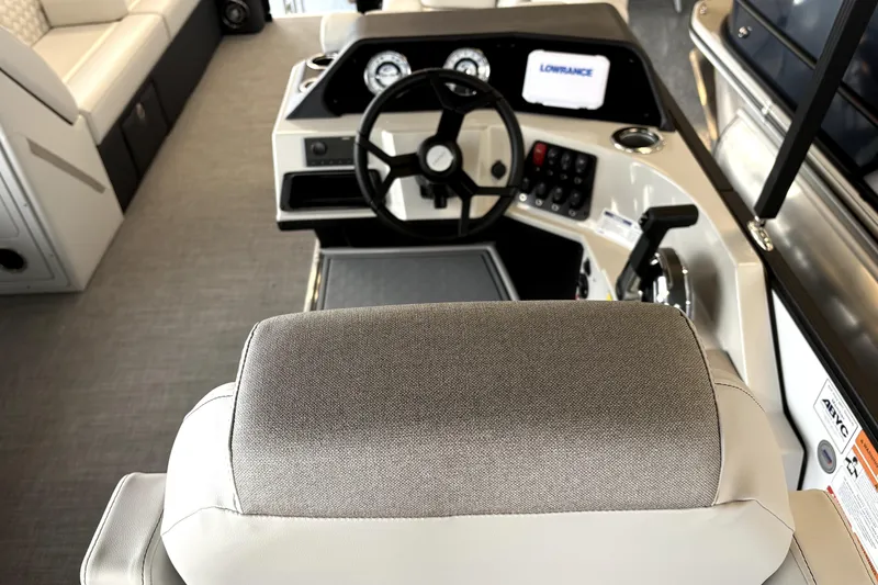 Slide: The Image of Interior of Crest 235 SLSC CONQUEST 2026 with steering console. - 6
