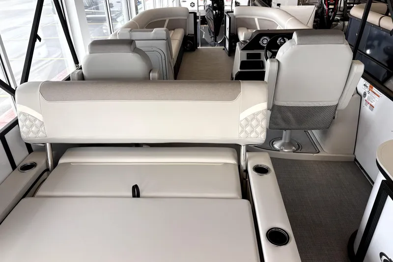 Slide: The Image of Interior of 2026 Crest 235 SLSC CONQUEST with luxurious seating. - 8