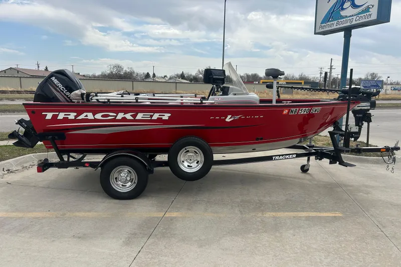 The Image of 2016 Tracker Pro Guide V-16 SC boat on trailer at Premier Boating Center. - 0